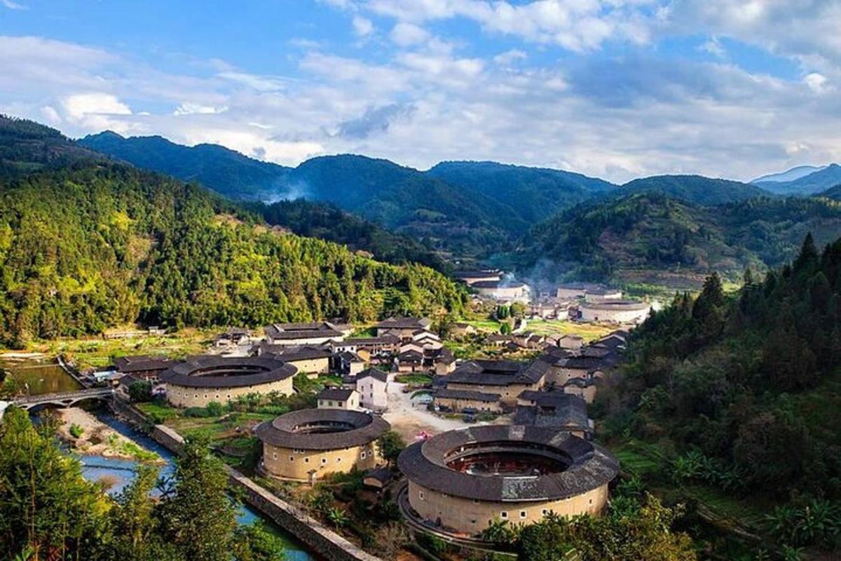 an aerial view of a village in the mountains