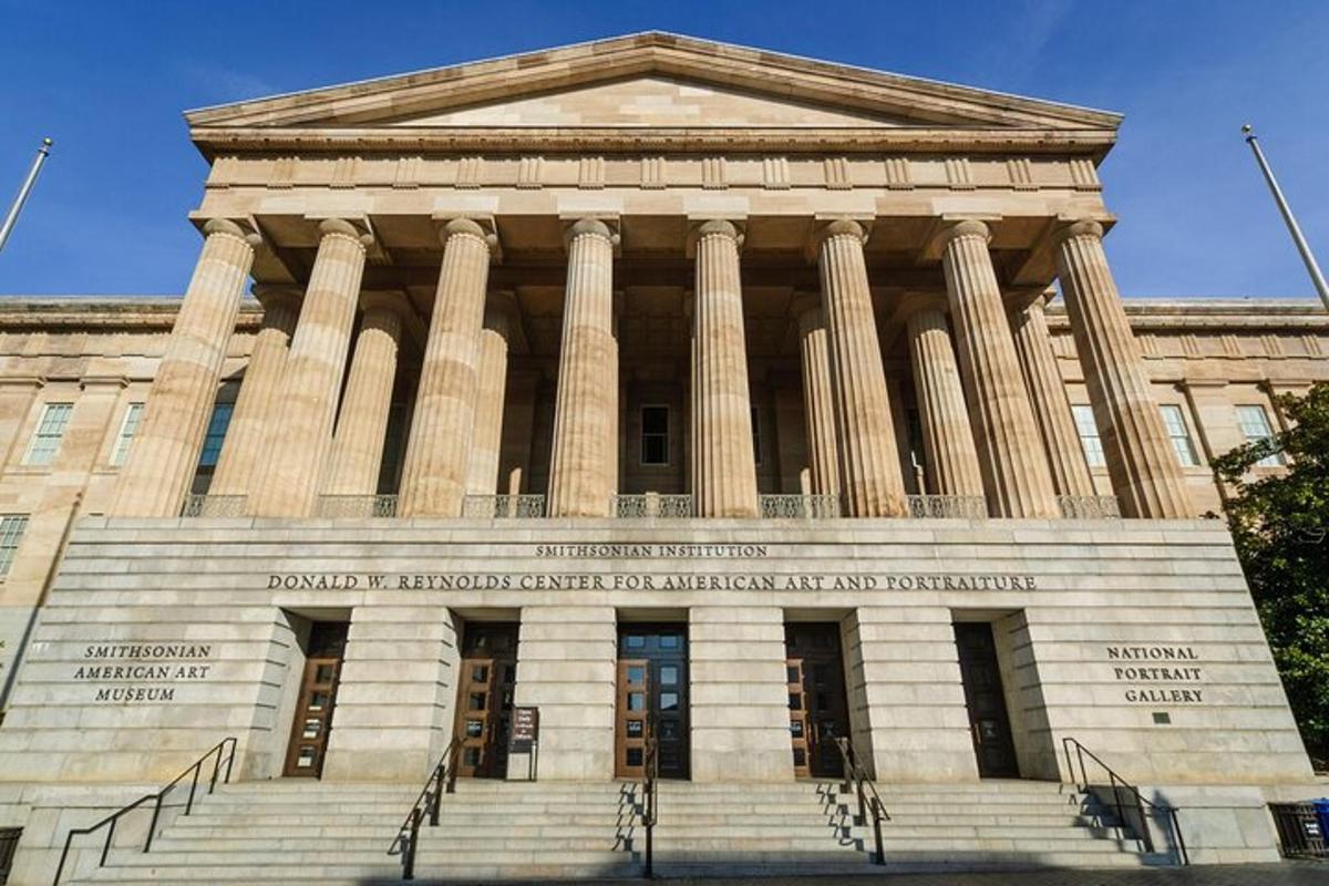 a large building with columns and steps in front