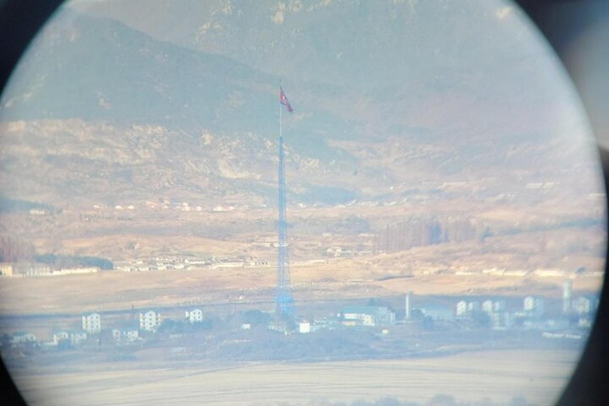 a view of a flag pole from an airplane window