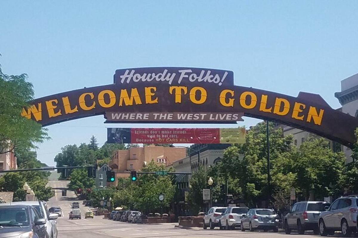 a welcome to golden sign on a city street