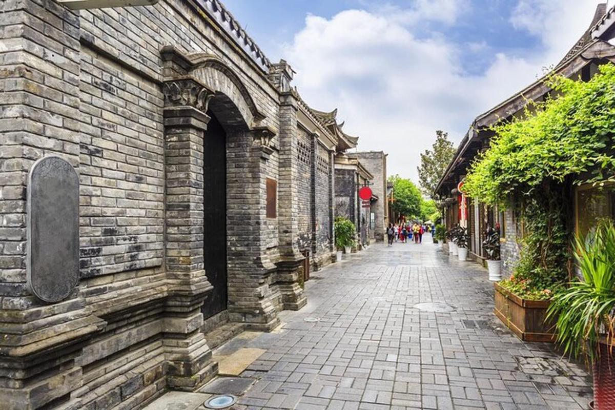 a cobblestone street in an old brick building
