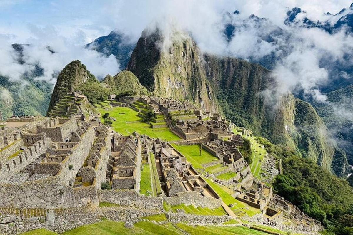 an aerial view of machu picchu with a mountain
