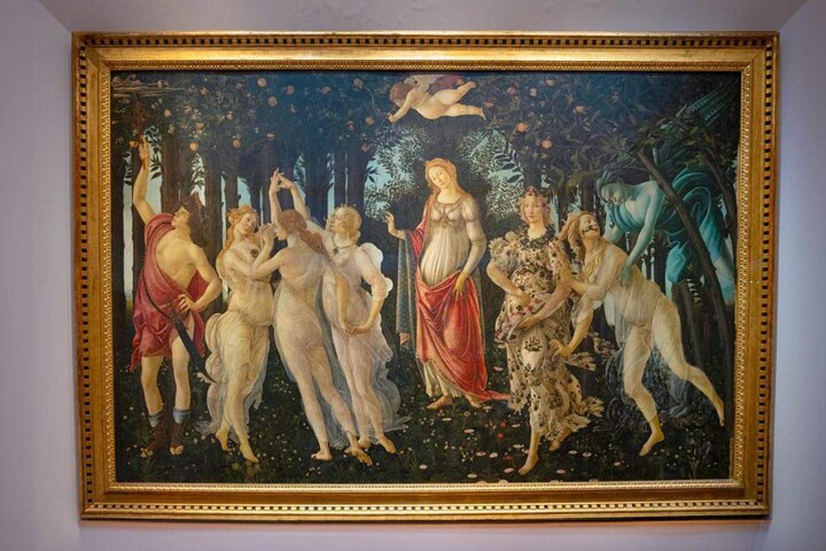 a painting of a group of women on a wall