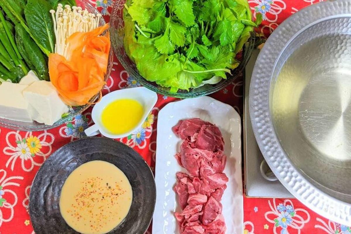a table with a bunch of vegetables and other ingredients