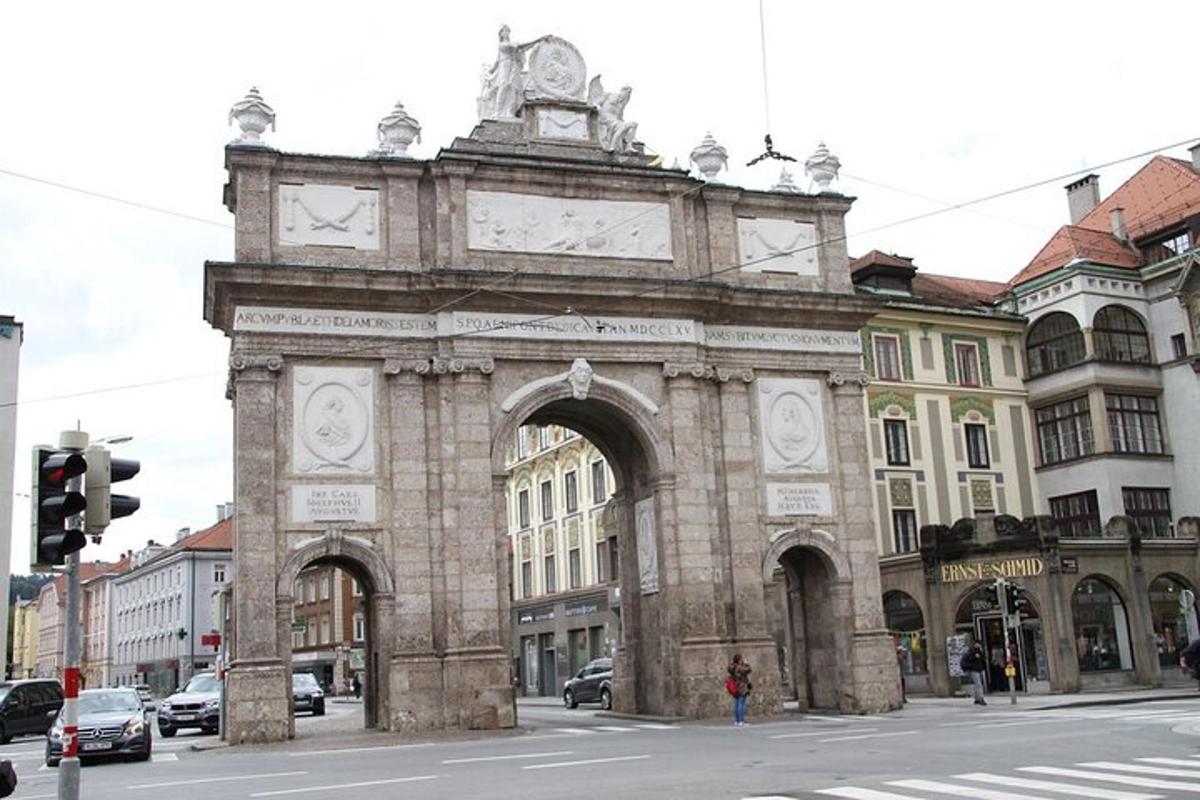 an old building with a clock tower on a street