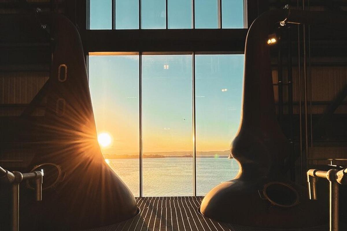 a room with a window with a view of the ocean