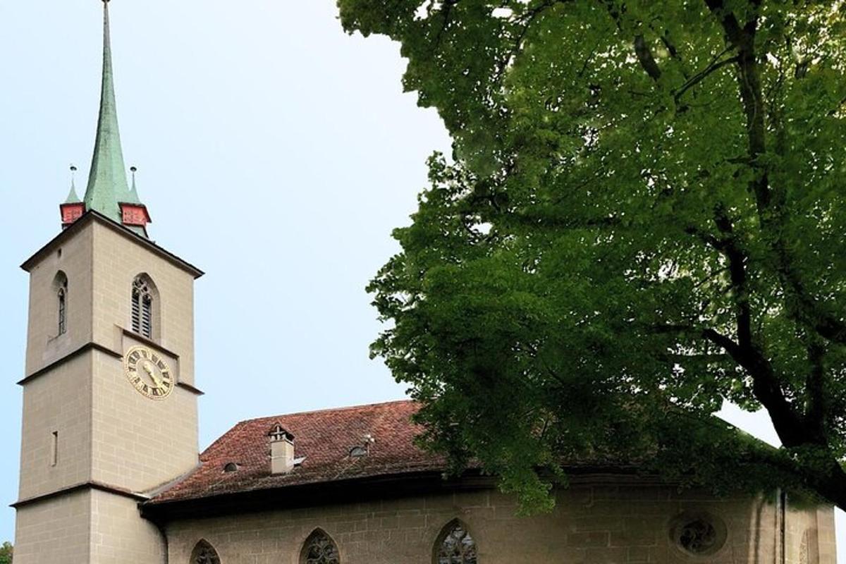 a church with a clock tower on top of it