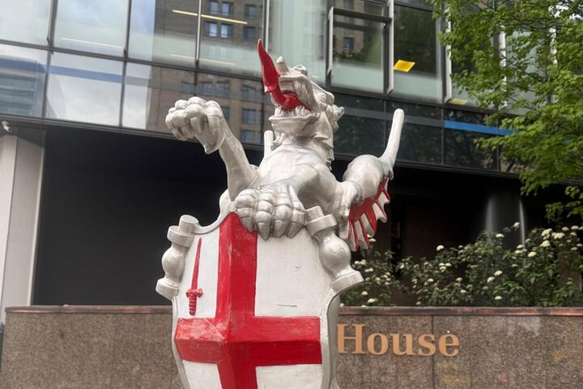 a statue of a horse on top of a building