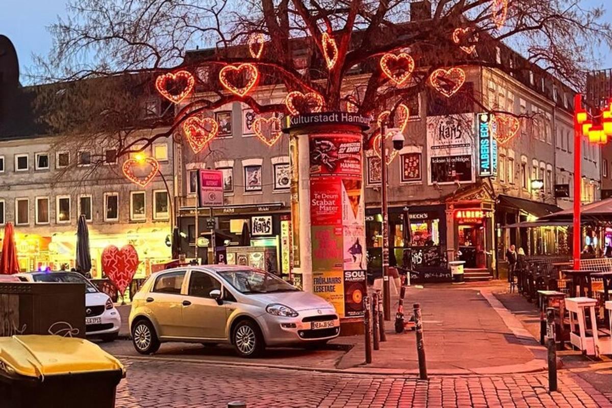 a city street with cars parked on the street