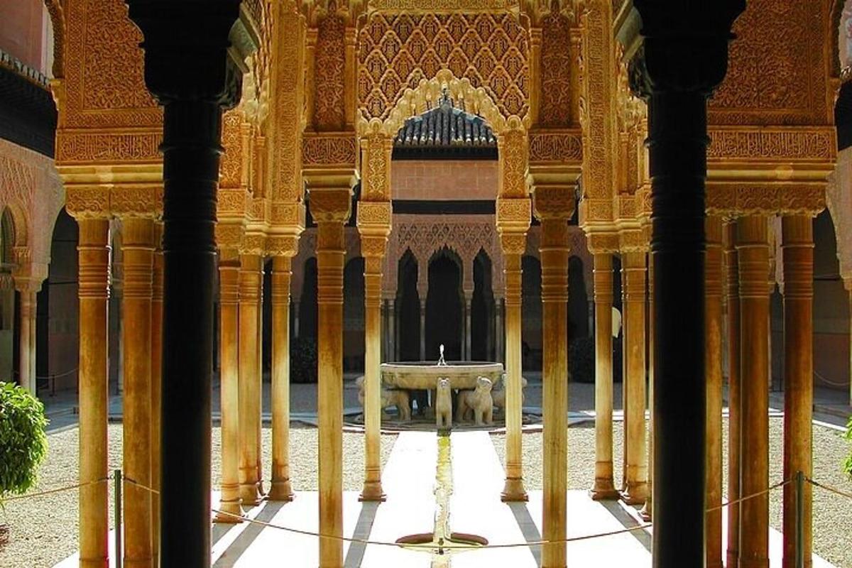 a courtyard with a fountain in a building