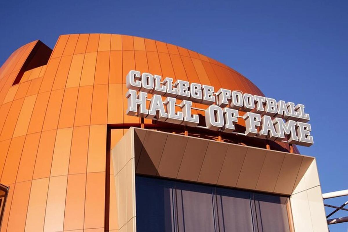 a building with a sign that reads college football hall of fame