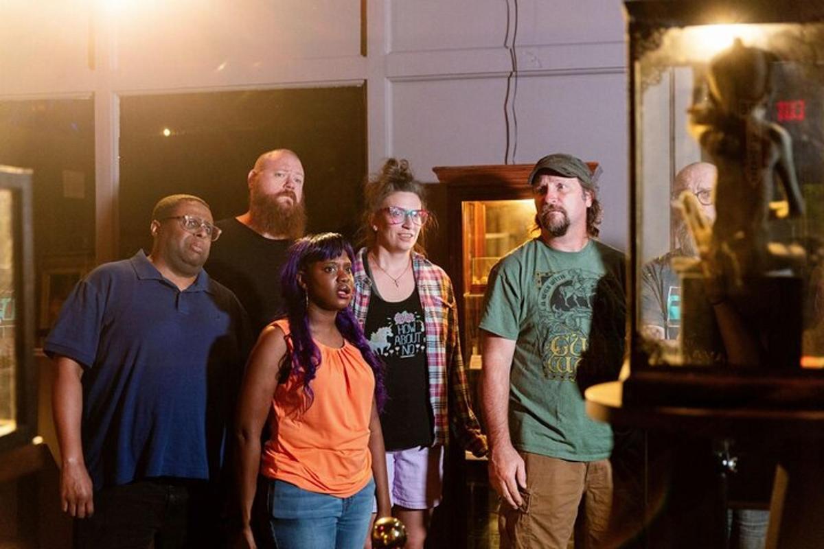 a group of people standing in a room
