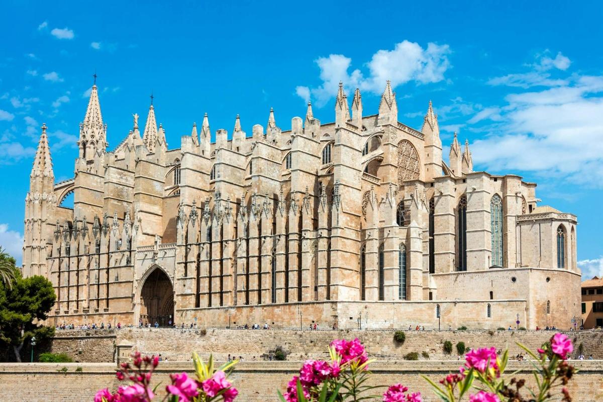 a large stone building with spires on top of it