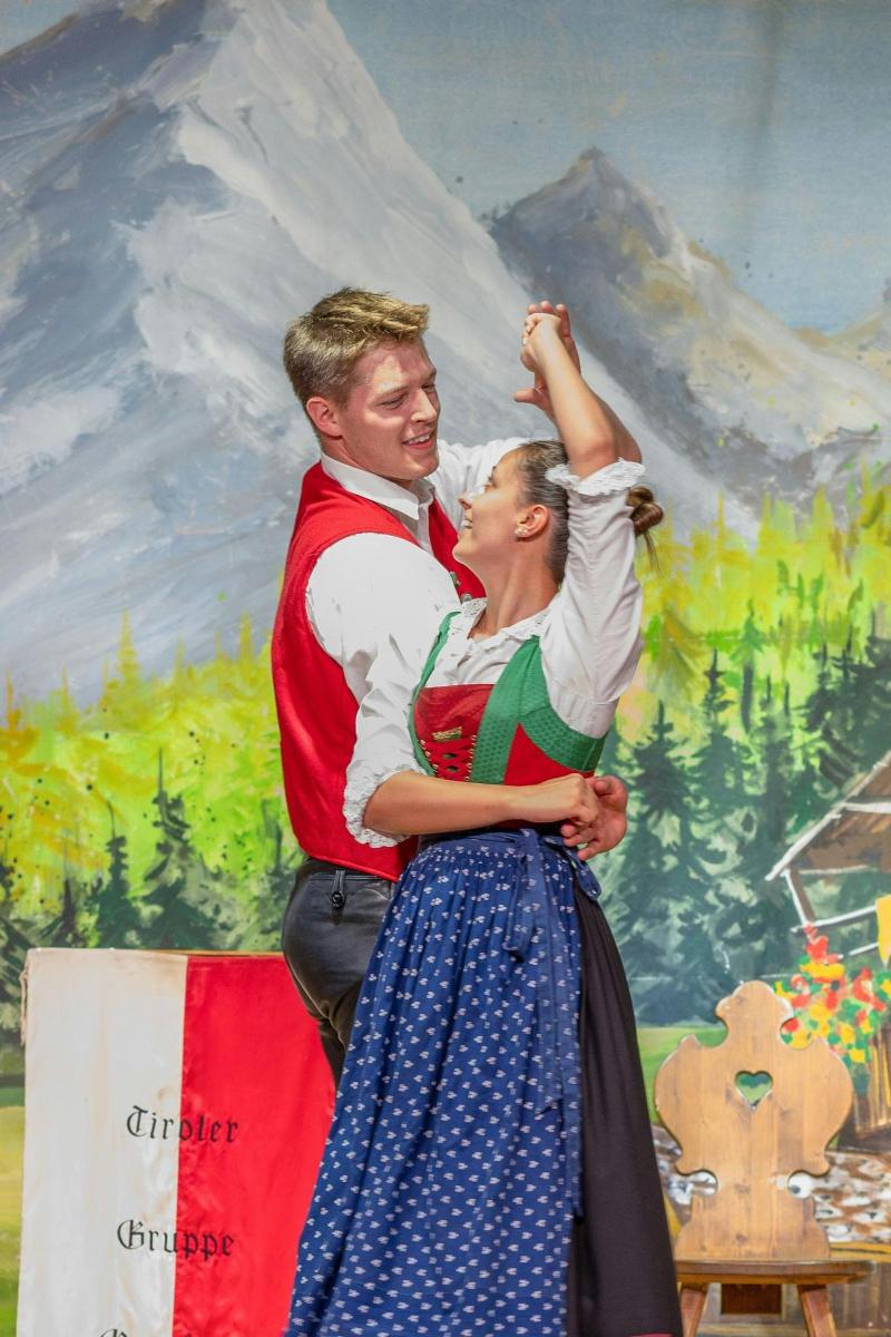 a painting of a man and a woman hugging
