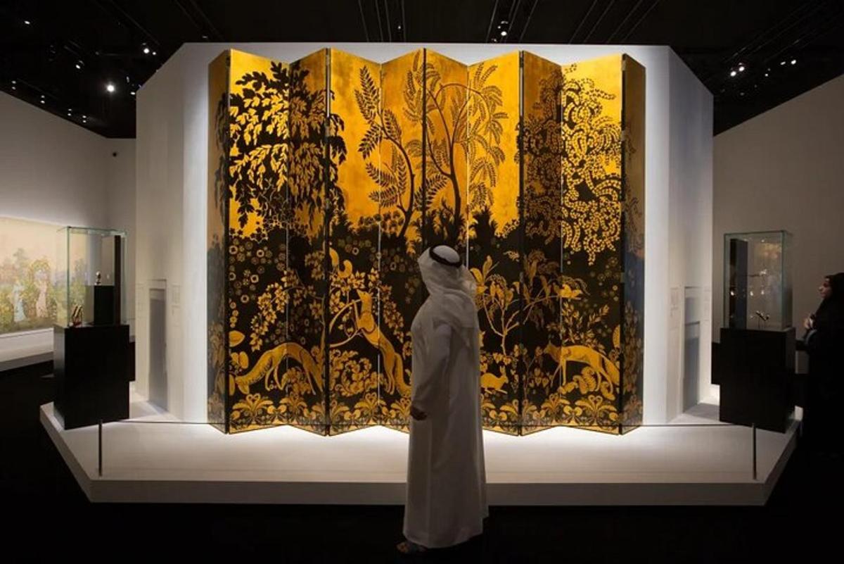 a person standing in front of a painting in a museum