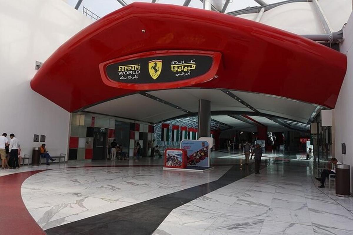 a large red building with people in a mall