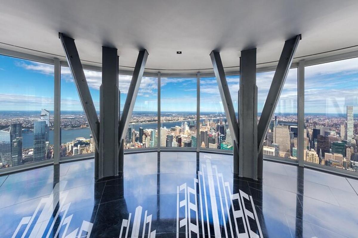 an expansive view of the city from the observation deck of a building