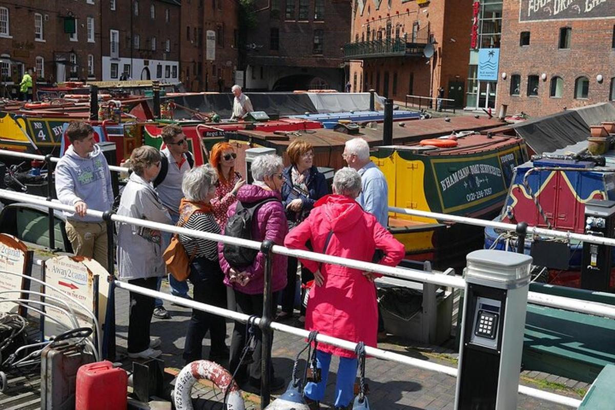 a group of people standing around in a harbor