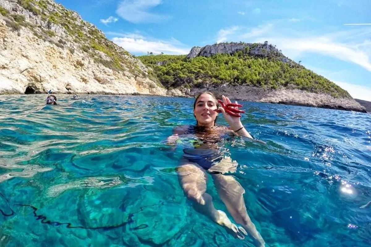a woman is swimming in the water