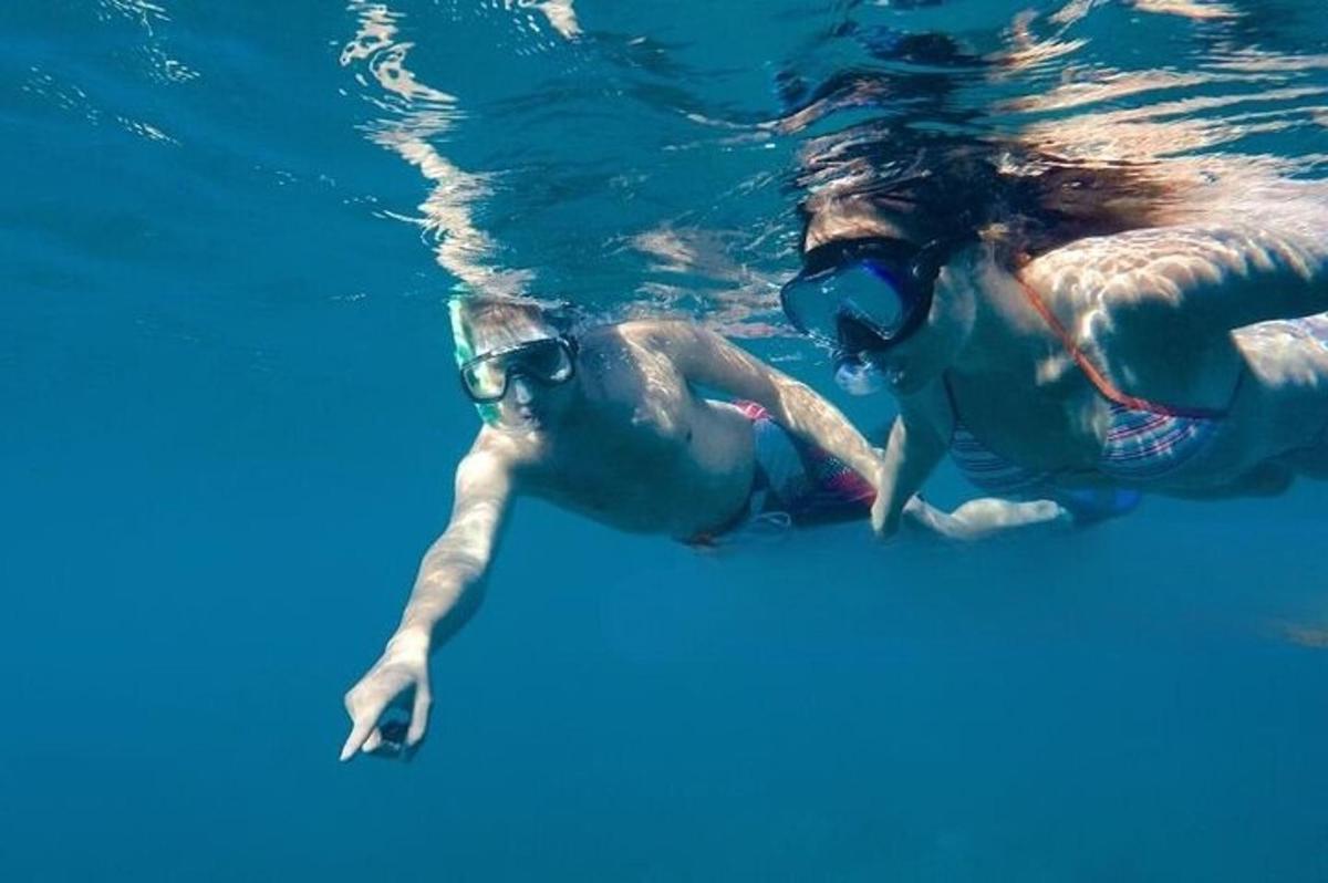 a woman swimming in the water in the water