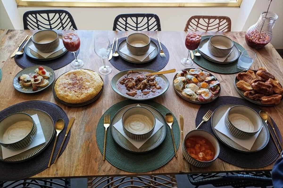 a wooden table with plates of food on it