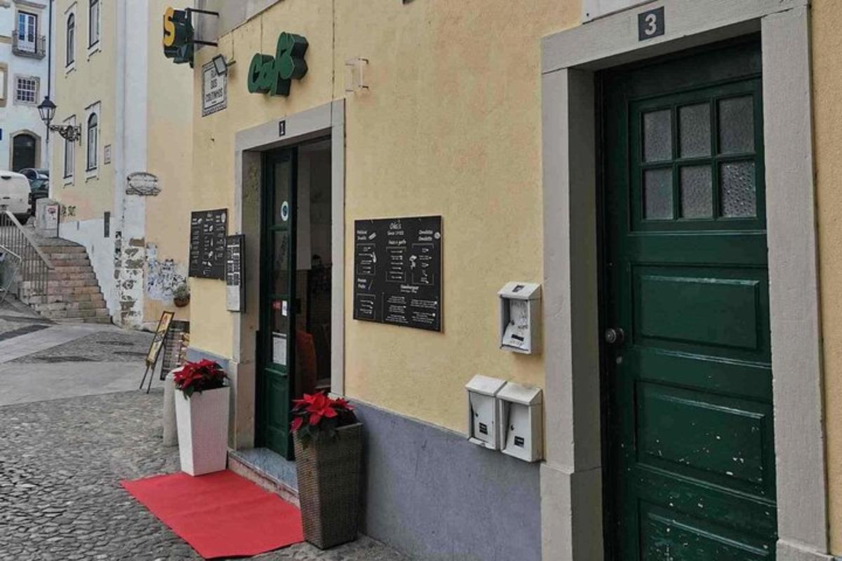 a green door on the side of a building