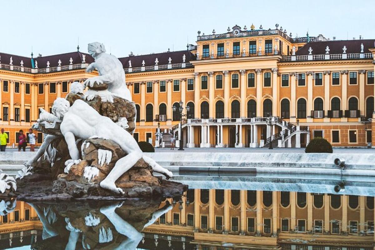 a statue in front of a large building