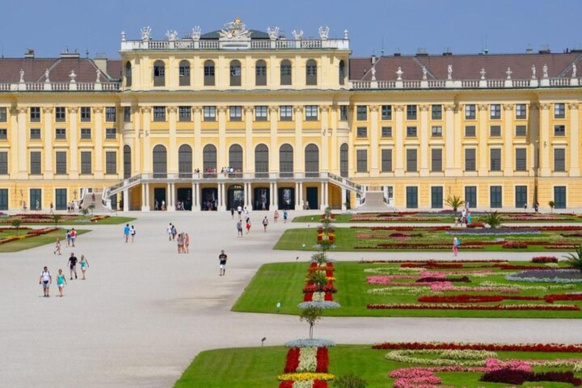 a large building with people walking in front of it