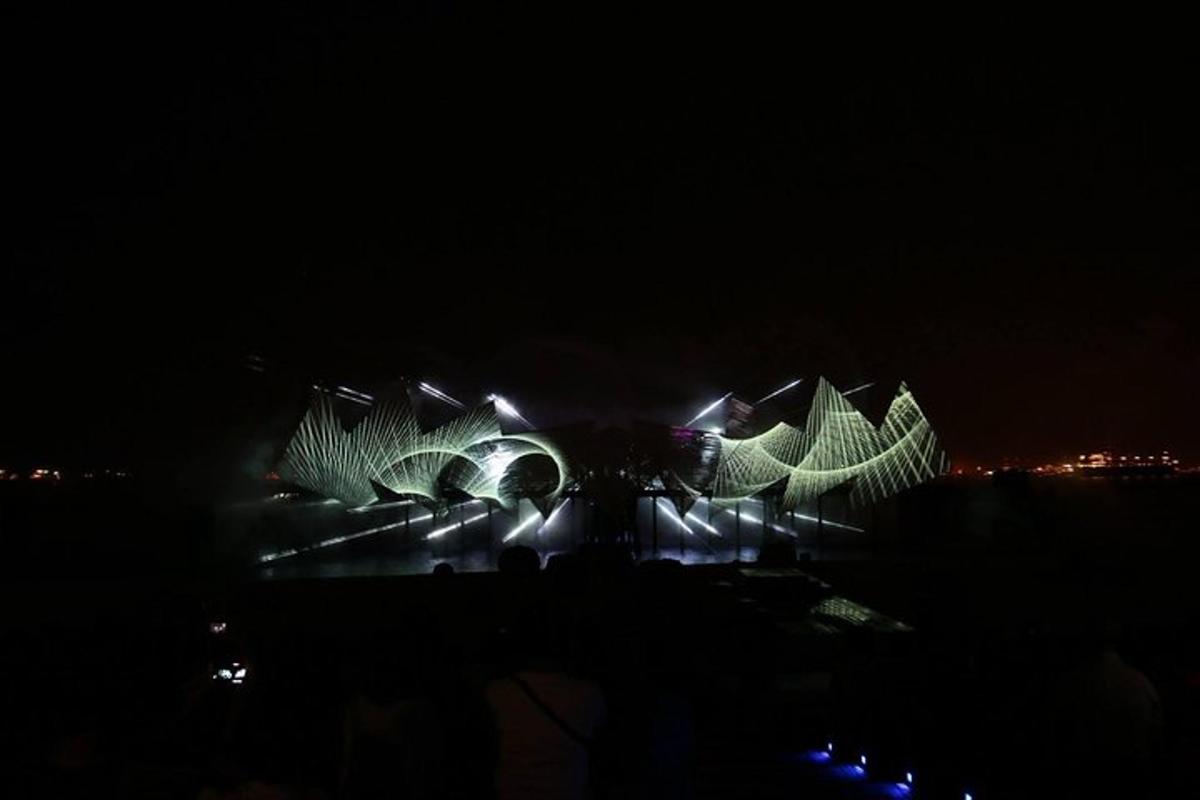 a night time view of a building with lights