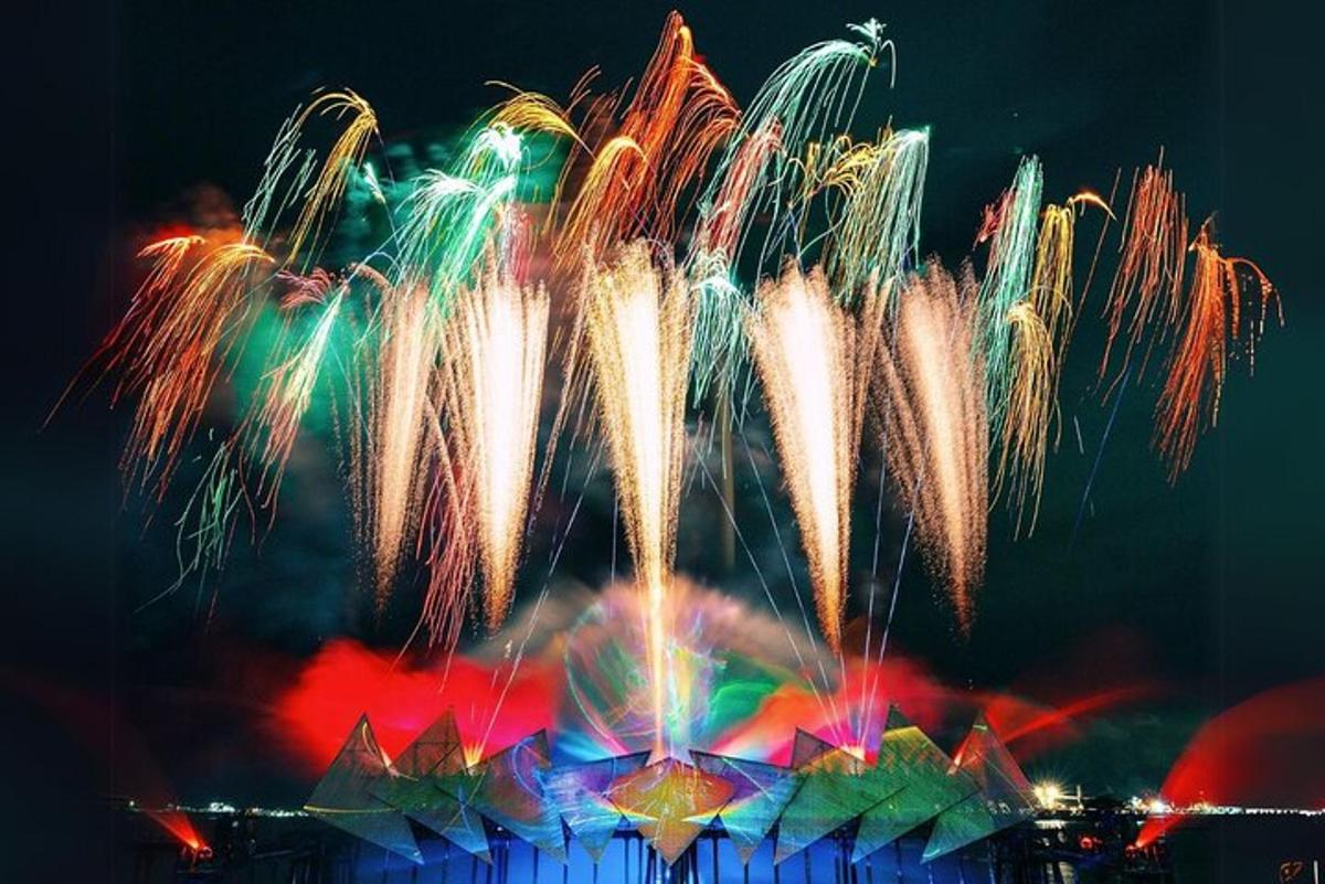 a fire show with fireworks in the sky