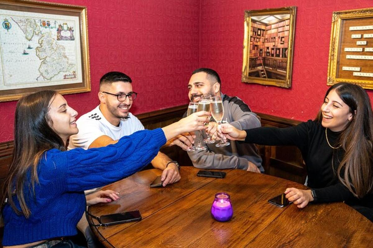 a group of people sitting around a table with a glass