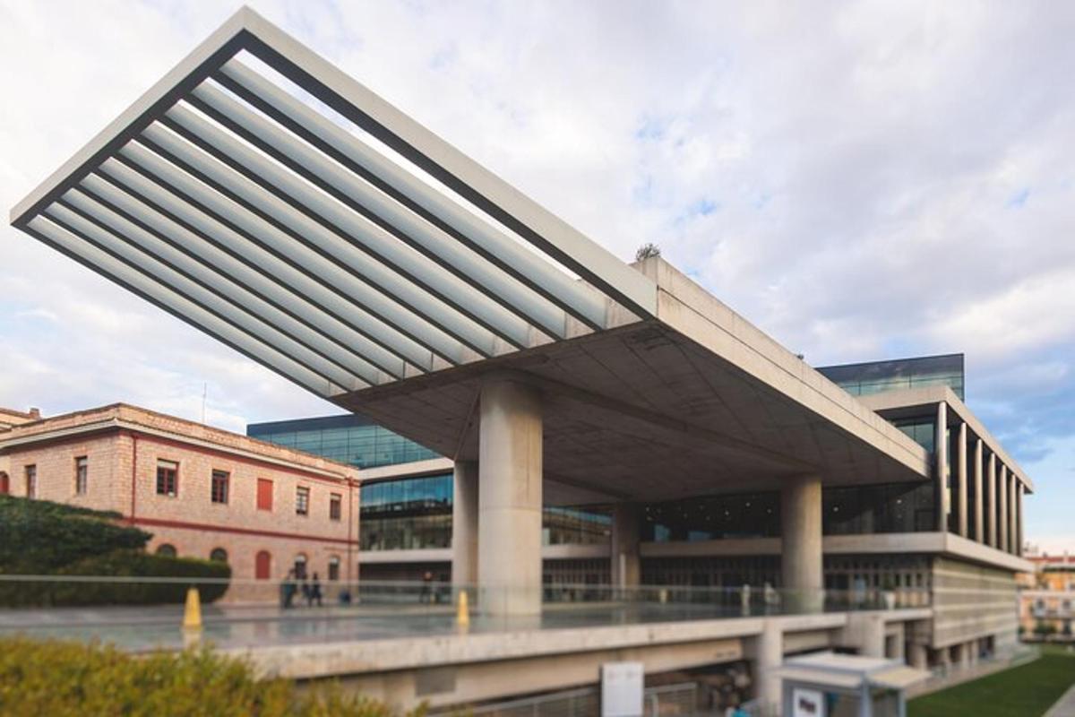 a large building with a large roof in front of it