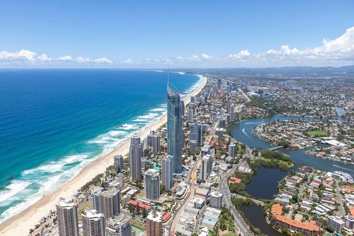 an aerial view of a city and the beach