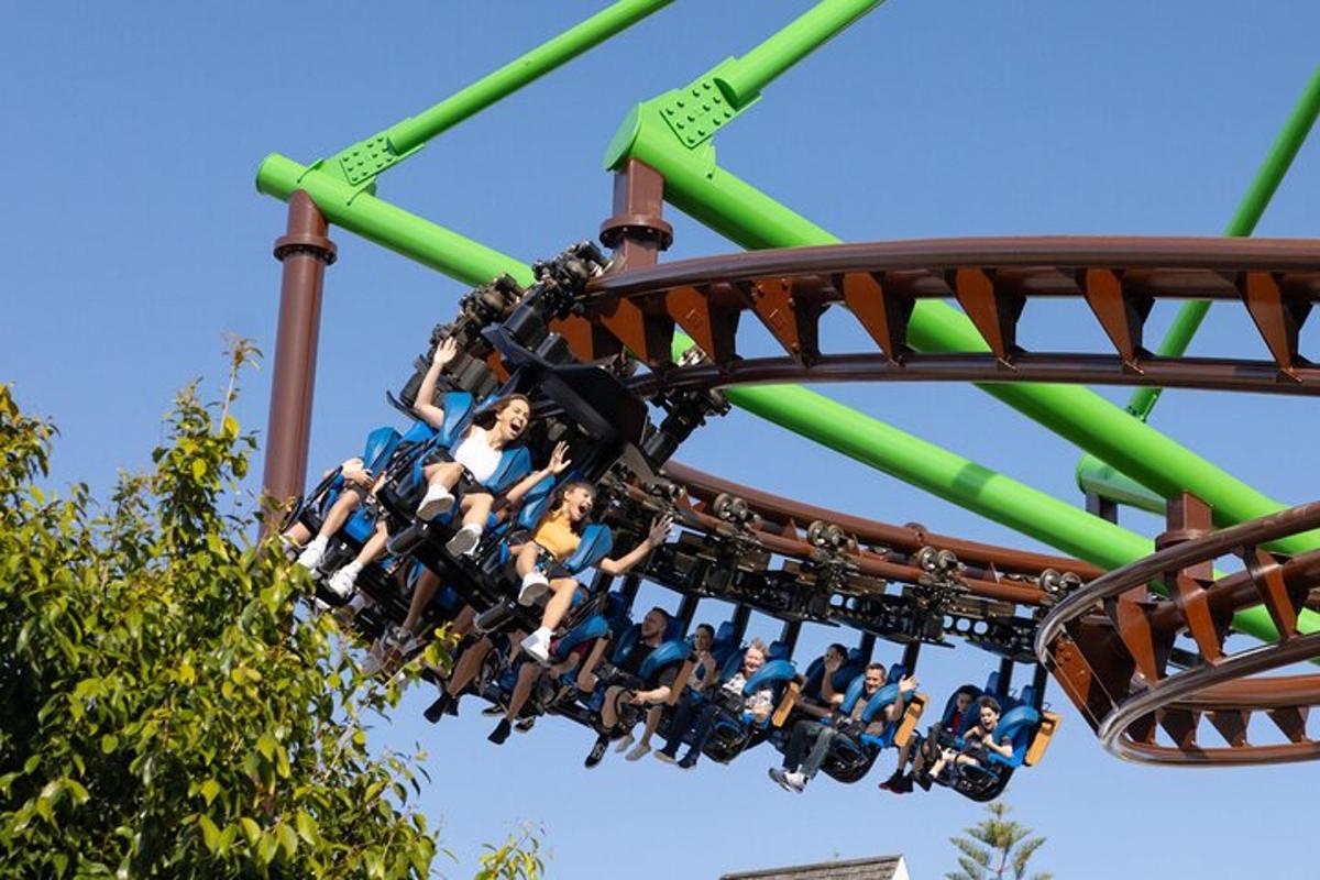 a group of people riding on a roller coaster