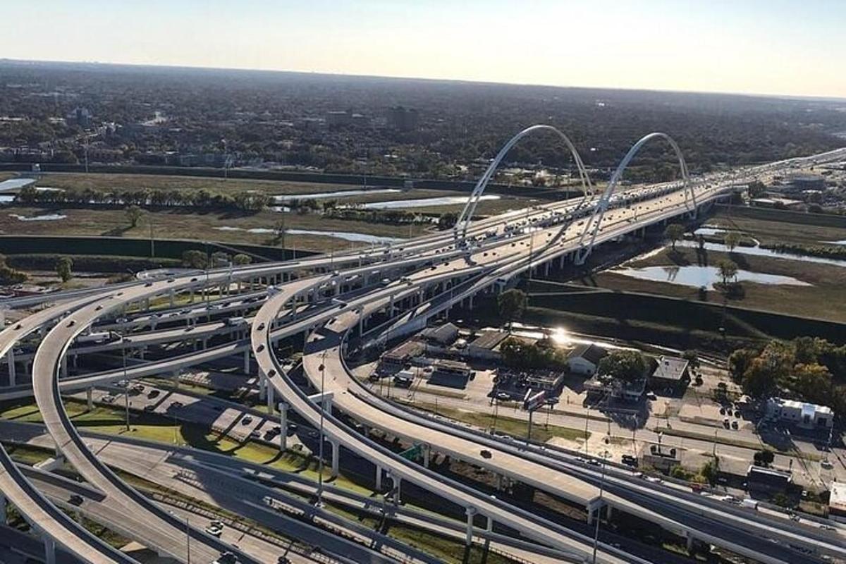 an overhead view of a highway with traffic on it