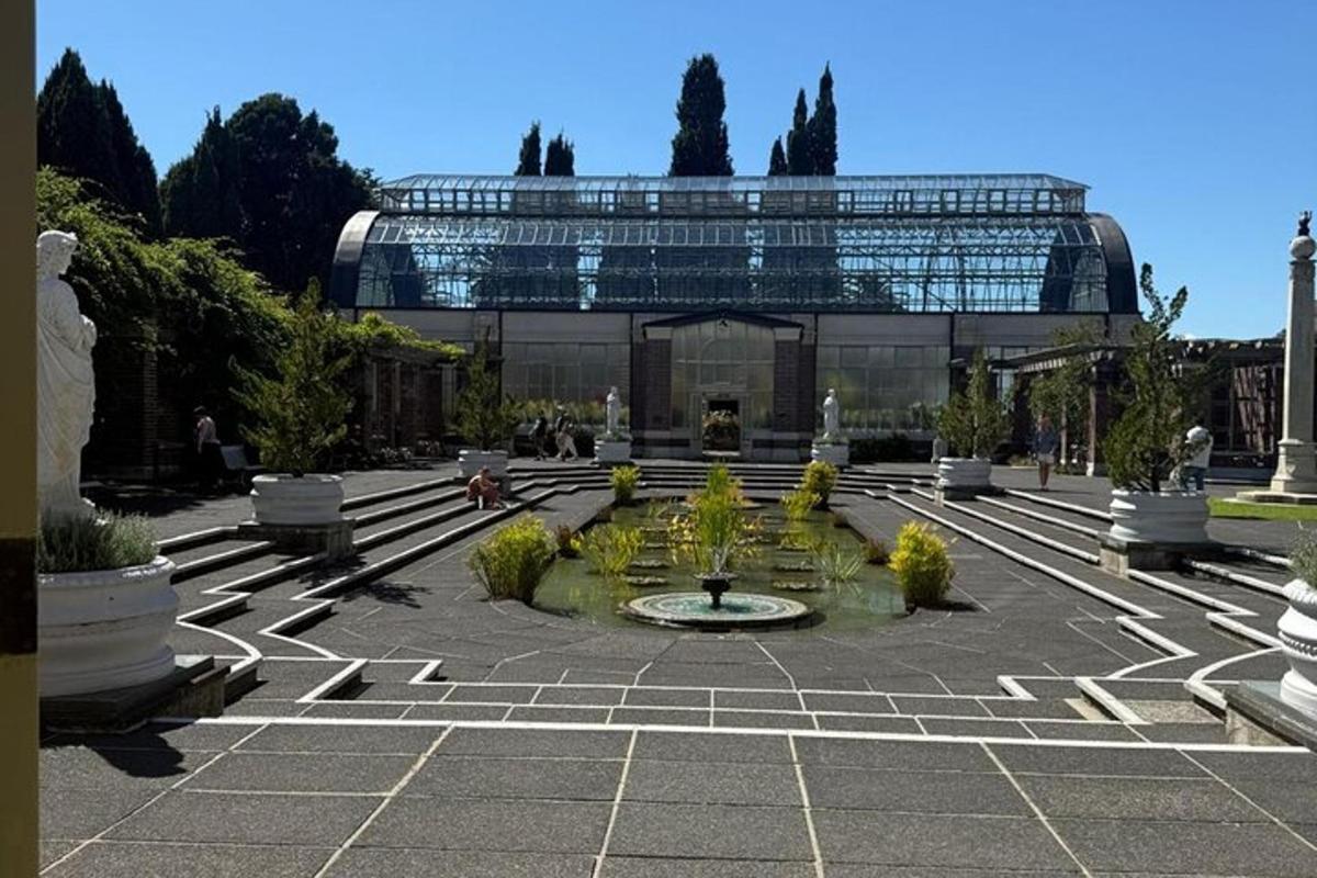 a building with a fountain in the middle of a courtyard
