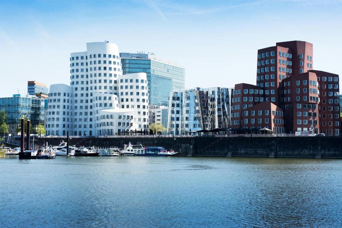 a view of a city with a river and buildings