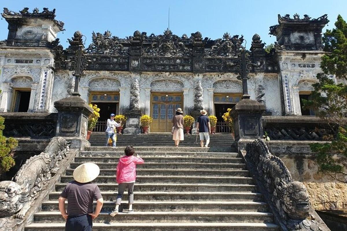 a group of people walking up the stairs of a building