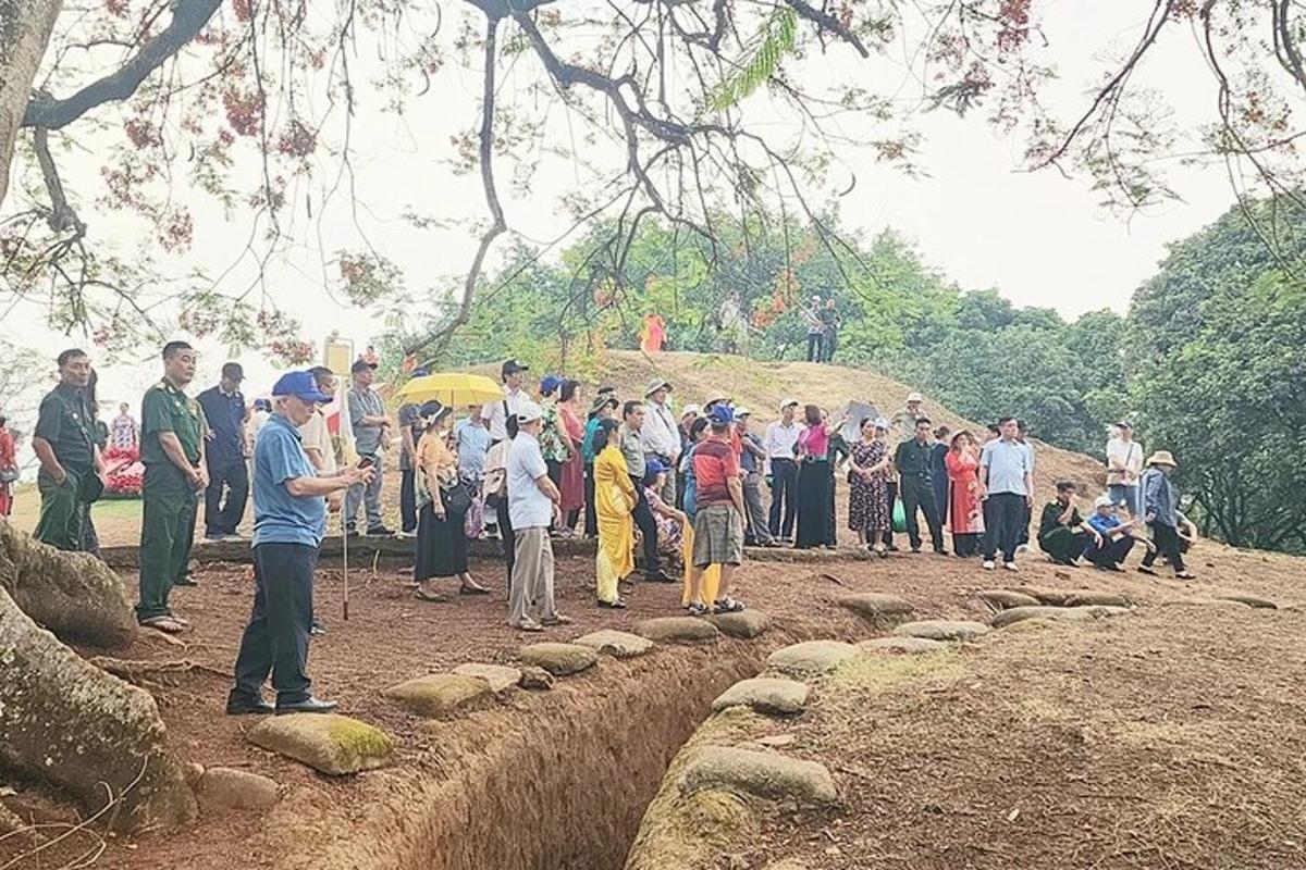 a group of people standing around in a group