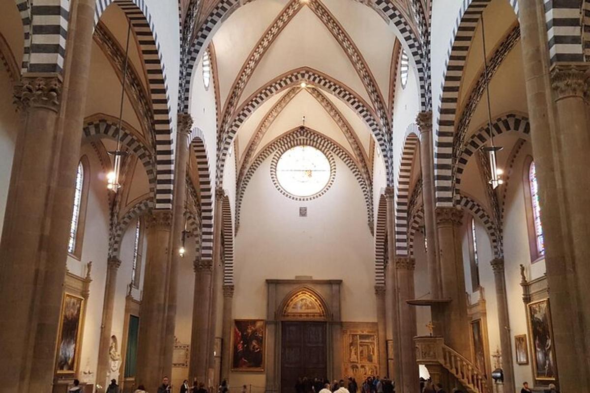 a large church with a large archway and a door