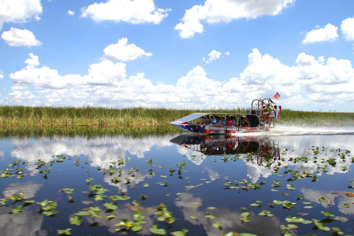 a boat in the water with people on it
