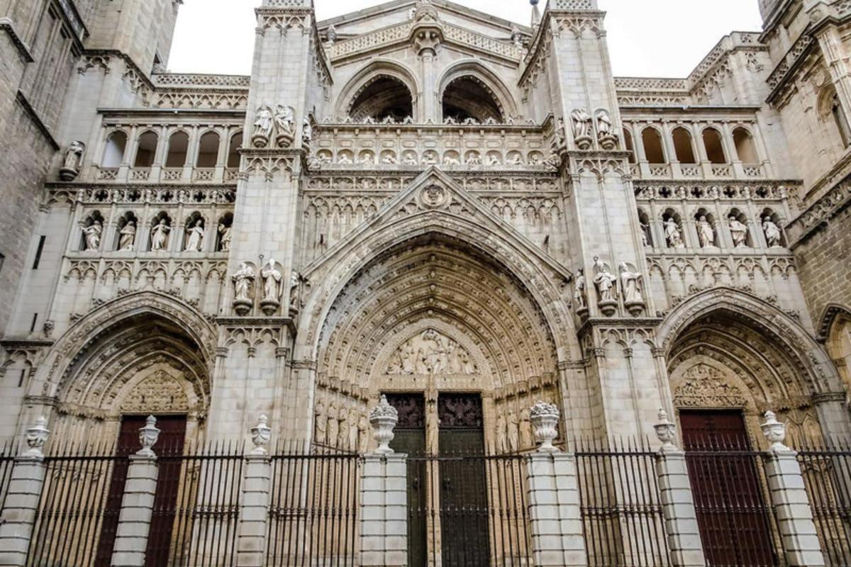a large building with a fence in front of it