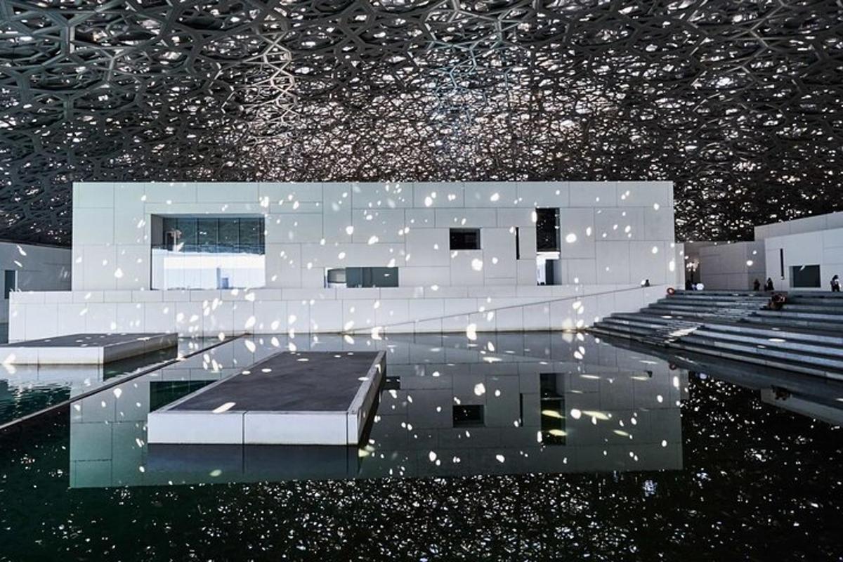 a rendering of a building with a reflection in the water