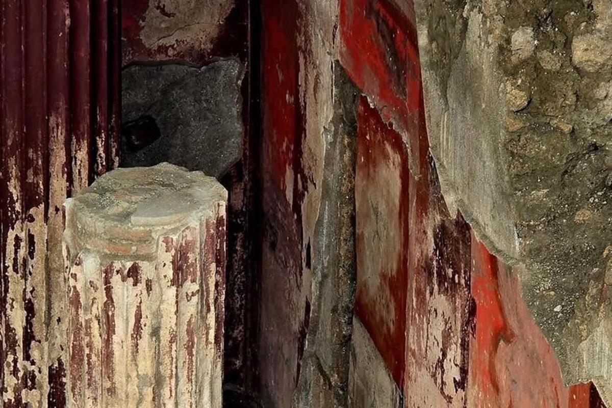 a painting of a wooden door with a red door