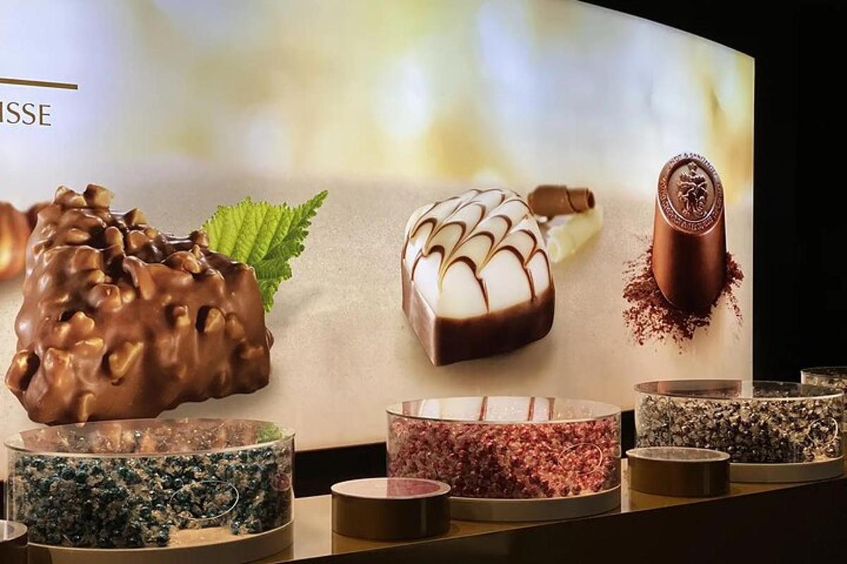 Una exhibición de diferentes tipos de donas en una mesa.