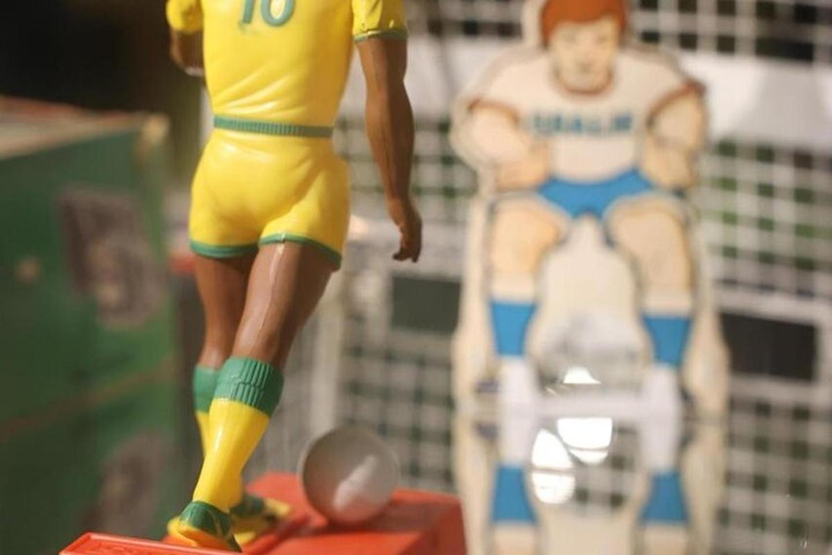 a toy figure of a football player on a table