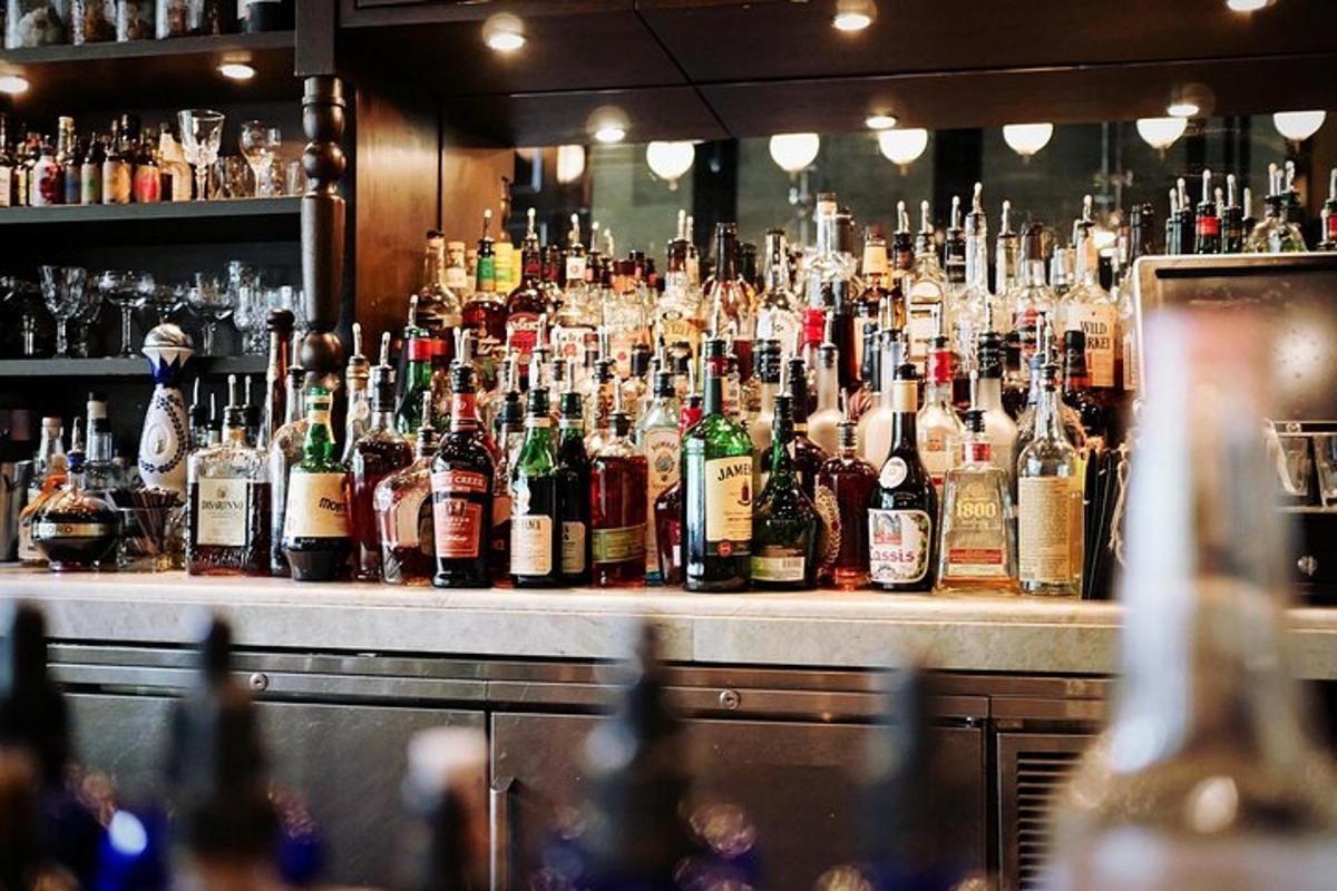 a bar filled with lots of bottles of alcohol