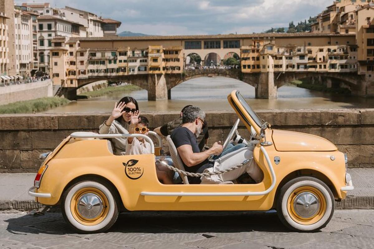 a group of people riding in a yellow car