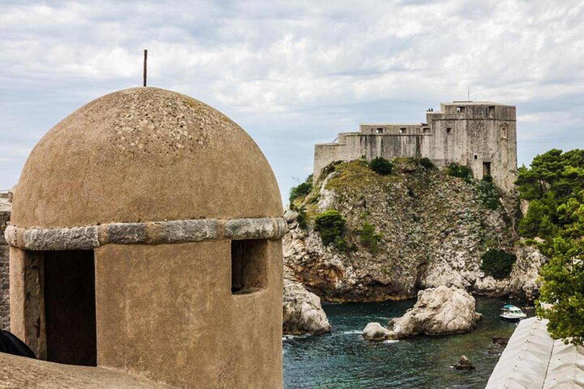 a castle sitting on top of a body of water