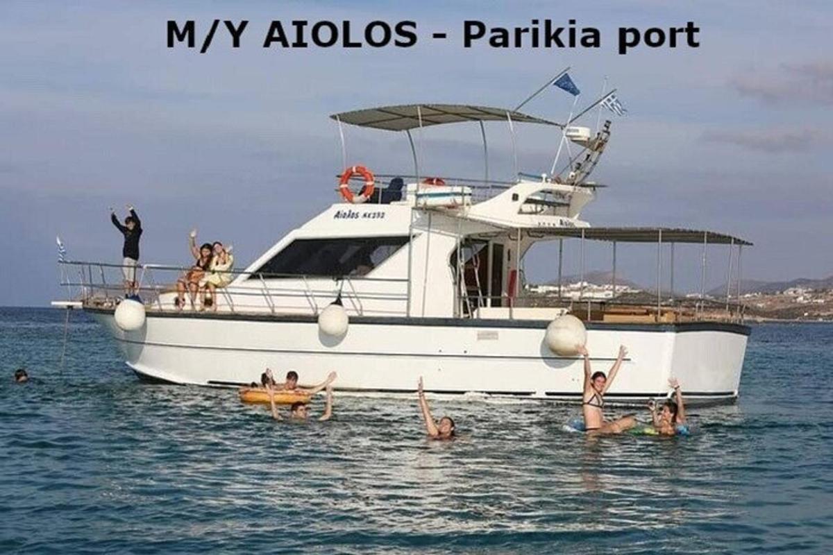 a group of people on a boat in the water